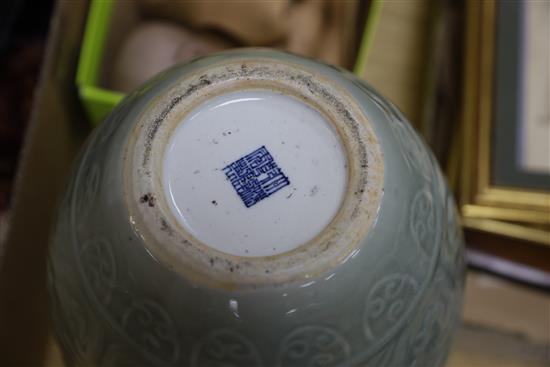 A Chinese celadon glazed archaistic moulded vase, Qianlong underglaze blue seal mark to base, probably 19th century, H.30cm